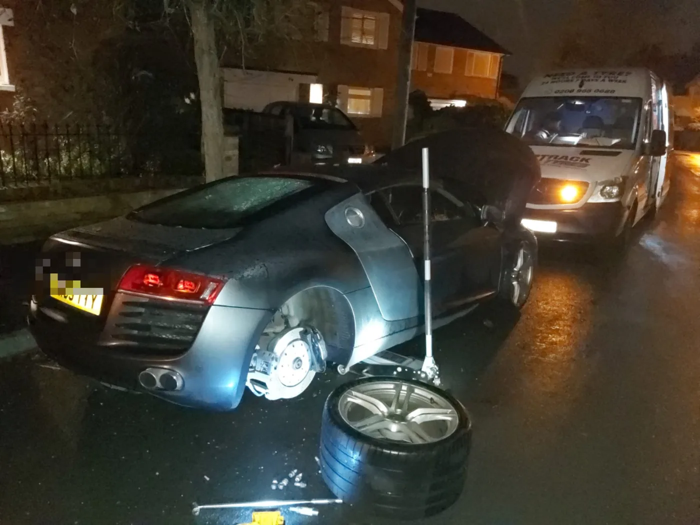 Audi R8 V10 on a night-time mobile tyre change, Fastrack van lighting the scene