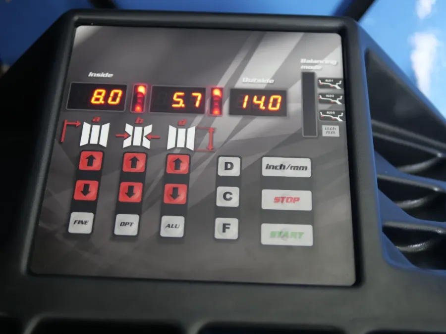 Computerised wheel-balancer inside the mobile tyre van