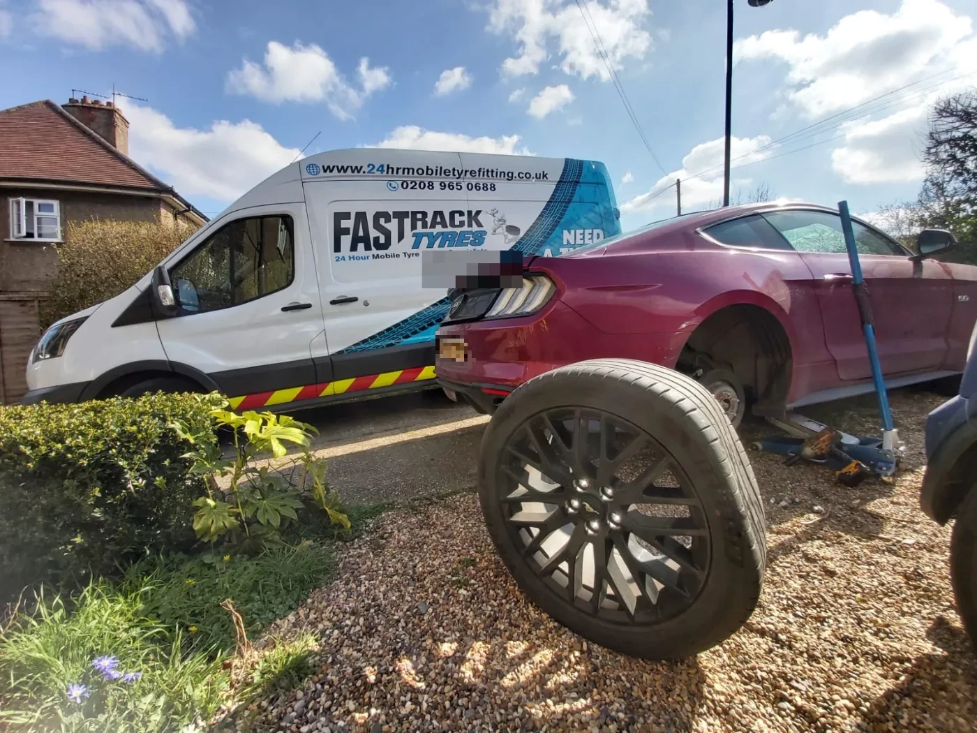 Ford Mustang GT 5.0 on a home driveway having a tyre fitted by Fastrack