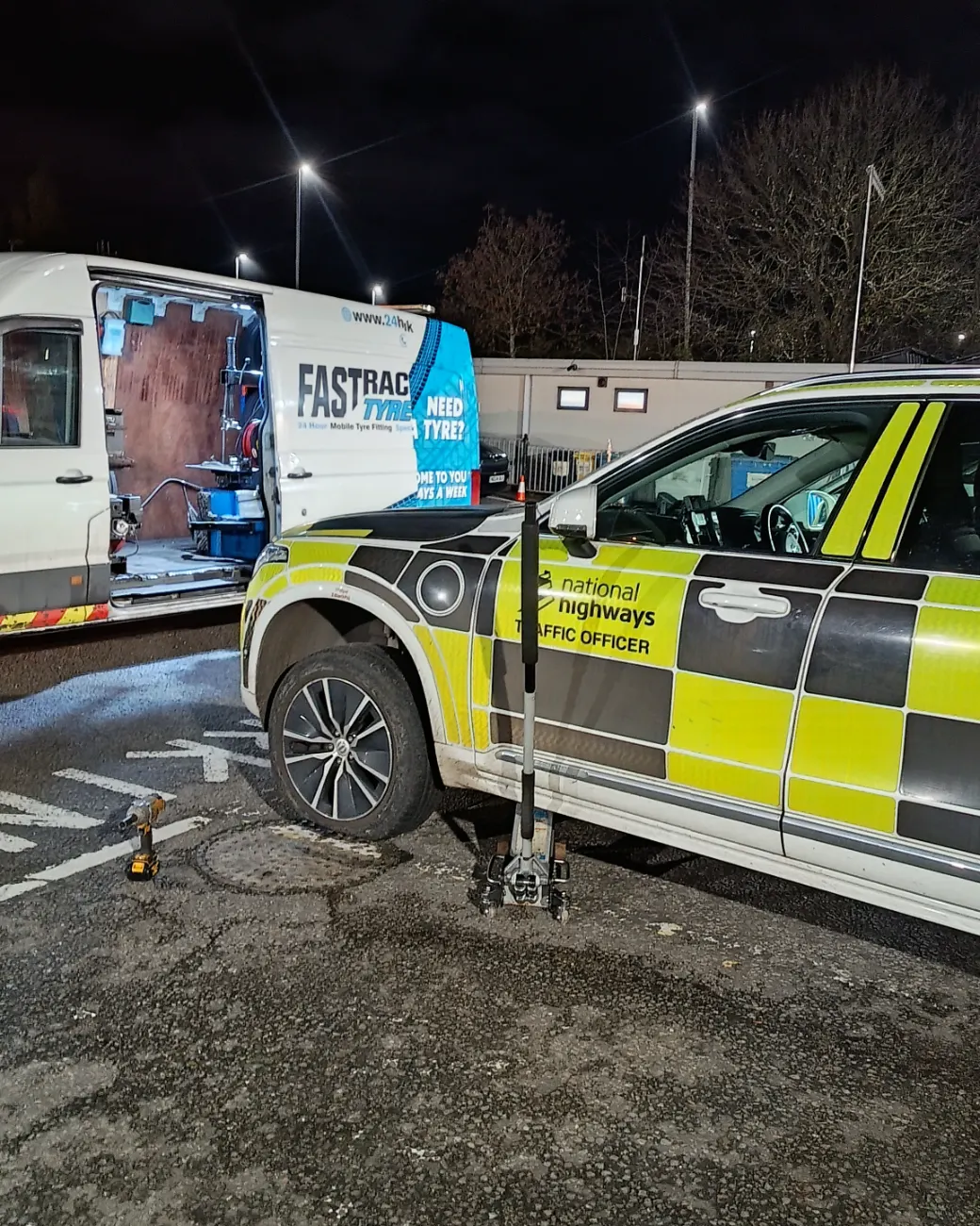 Fastrack assisting a National Highways traffic officer vehicle at night