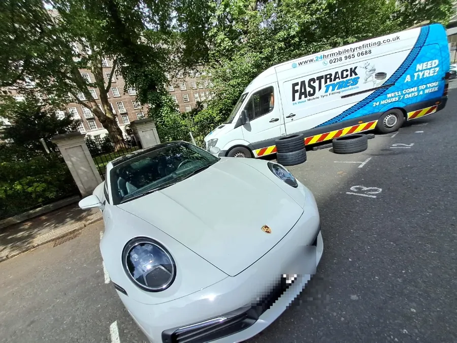 White Porsche 911 mobile tyre service