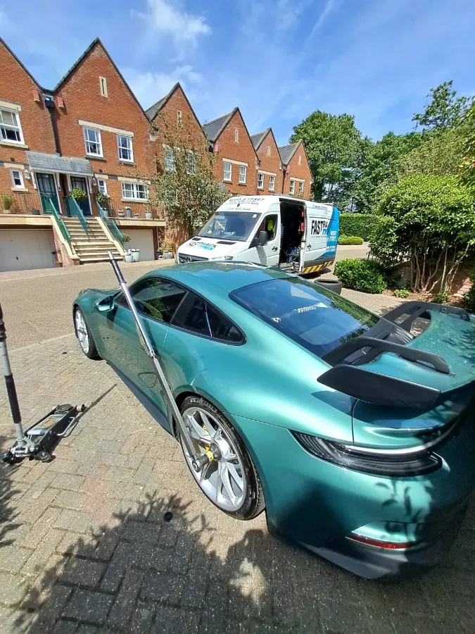 Porsche 911 GT3 tyre service on a London driveway