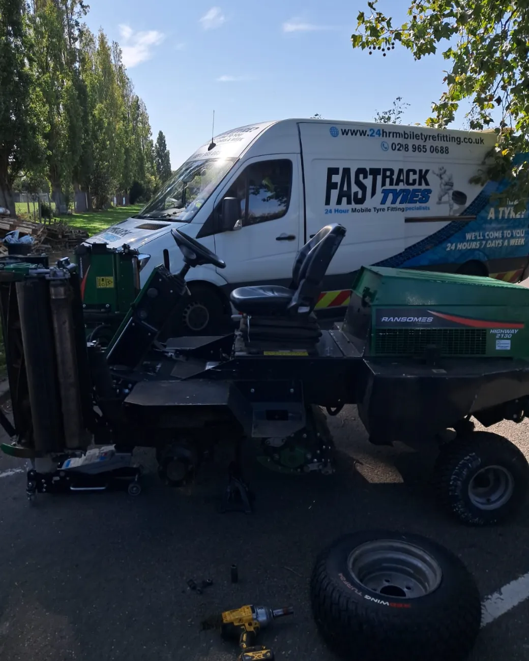 Fastrack changing a wheel on a Ransomes commercial mower