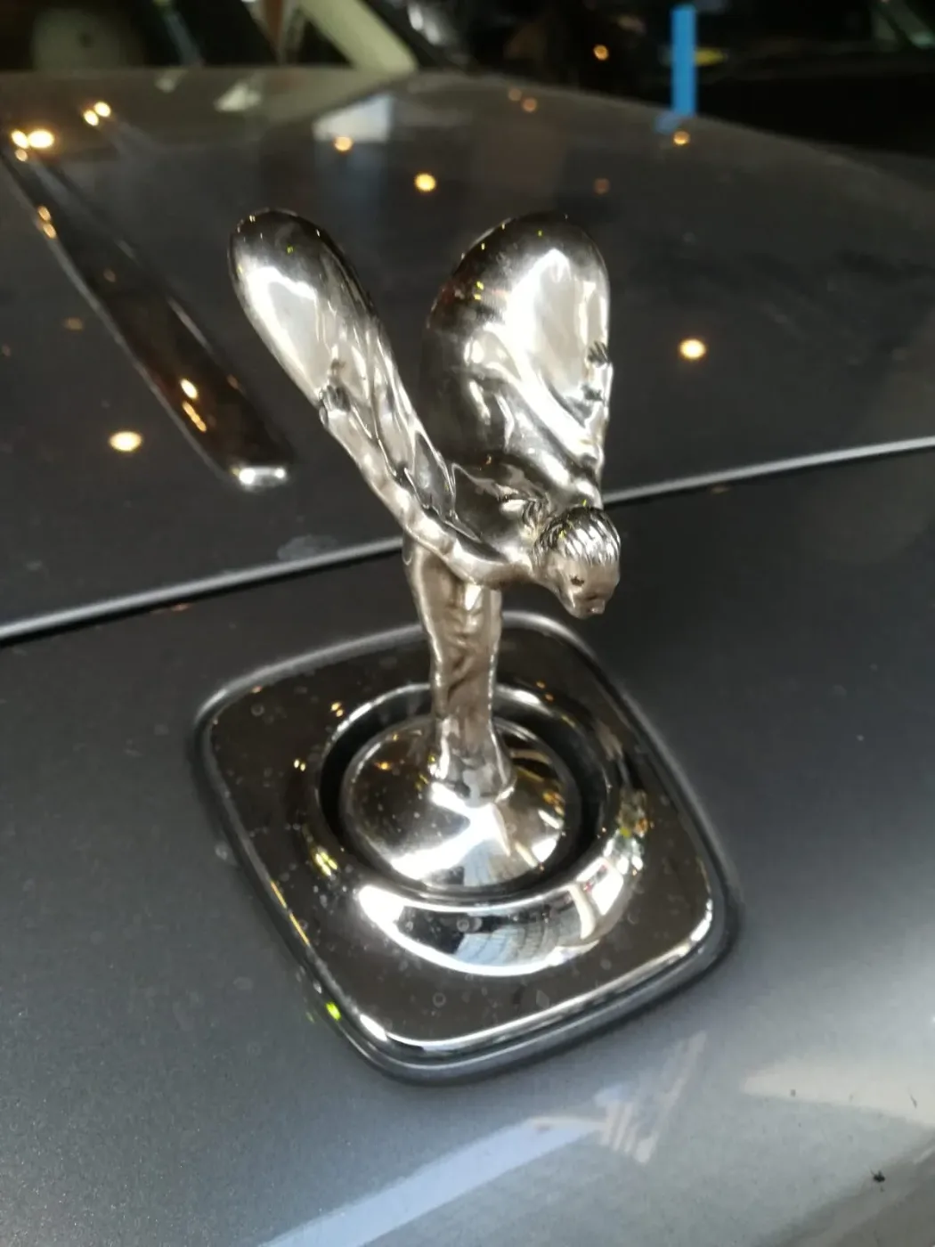 Close-up of the Spirit of Ecstasy on a Rolls-Royce during a tyre call-out