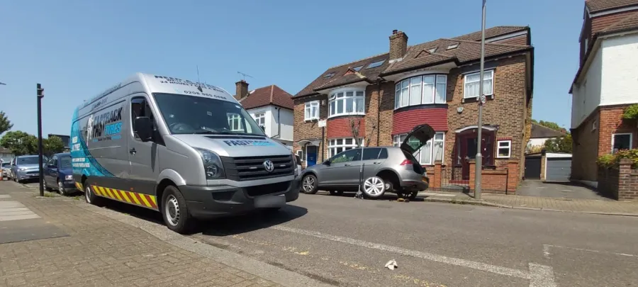 VW Golf mobile tyre fitting on a London residential street
